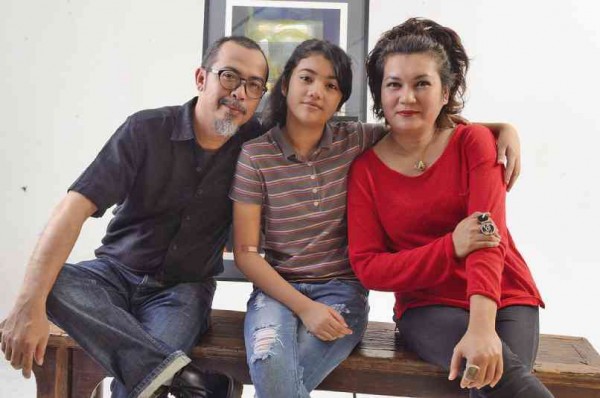 ALEGRE (left), with daughter Awit and wife Helena.