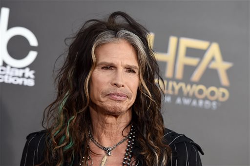 In this Friday, Nov. 14, 2014, file photo, Steven Tyler arrives at the Hollywood Film Awards at the Palladium, in Los Angeles. Aerosmith frontman Tyler is asking Republican presidential candidate Donald Trump to stop using the power ballad "Dream On" at campaign events. AP FILE PHOTO