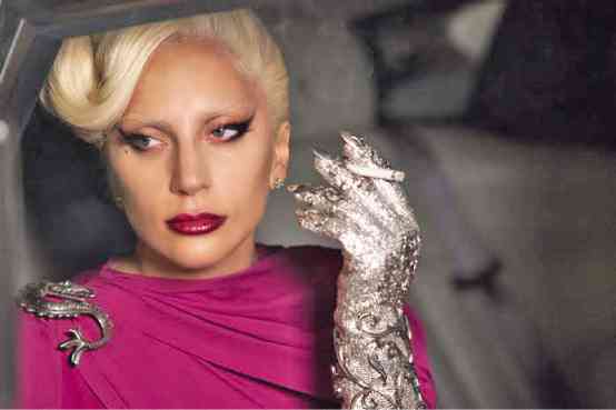 ON HER first day, Lady Gaga threw up in the car on her way to work.  RUBEN V. NEPALES