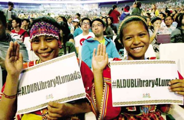 LUMAD women do the pabebe wave during the “Eat Bulaga” special at the Philippine Arena in Bocaue, Bulacan. Richard A. Reyes