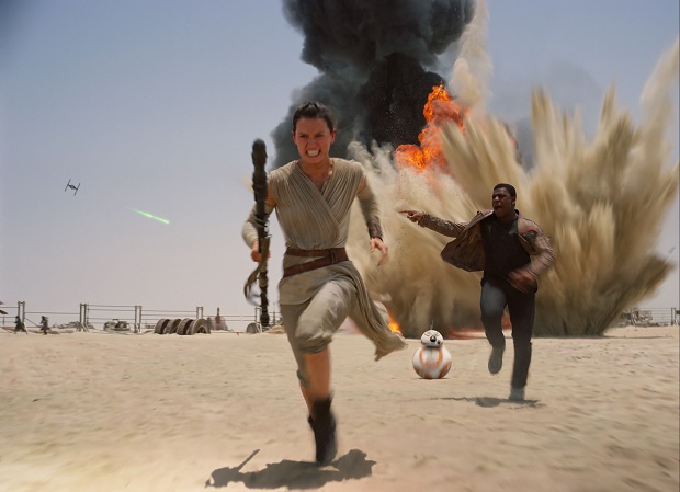 This photo provided by Disney shows Daisey Ridley as Rey, left, and John Boyega as Finn, in a scene from the new film, "Star Wars: The Force Awakens." Daniel Fleetwood, a 31-year-old Texan who is suffering from cancer, had his wish granted to see the highly anticipated new Star Wars film on Thursday, Nov. 4. His wife Ashley celebrated on her Facebook page that Daniel saw an unfinished version of the movie thanks to the films producers and director J.J. Abrams. The movie releases in the U.S. on Dec. 18, 2015. (Film Frame/Disney/Lucasfilm via AP)