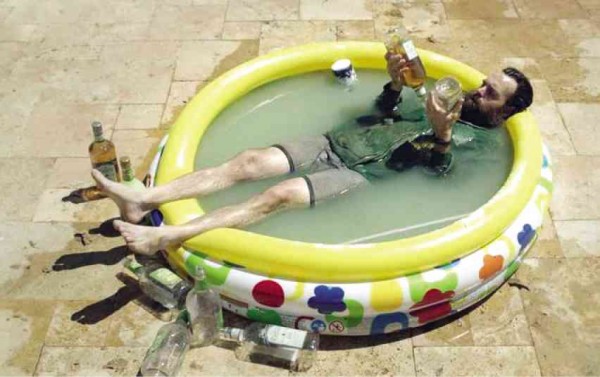 PHIL takes a dip in a cool tub of alcohol.