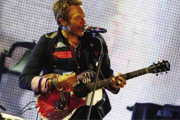 Chris Martin of Coldplay, with “A Head Full of Dreams” (inset)