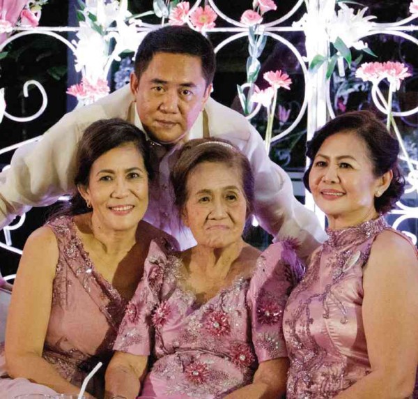 Mama Rosing (center) with Alita, Algier and Amor. CONTRIBUTED PHOTO