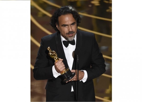 Alejandro G. Inarritu accepts the award for best director for “The Revenant” at the Oscars on Sunday, Feb. 28, 2016, at the Dolby Theatre in Los Angeles. (Photo by Chris Pizzello/Invision/AP)