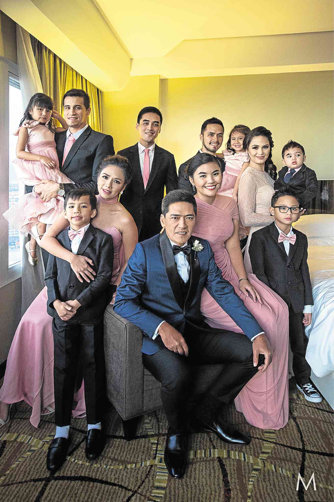 THE GROOM with his children and grandchildren