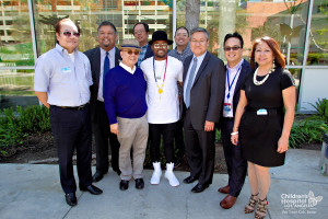 From left -- Apl.de.Ap Foundation International executive committe members Robbie Fabian, Mel Avanzado and Fritz Friedman; Executive Director Ted Benito; Apl.de.ap; Audie Vergara; Dr. Thomas Lee, division chief for CHLA Vision Center, Michael Sampiano, CHLA assistant vice president for development and Sonia Delen, chair of the Campaign for Filipino Children.