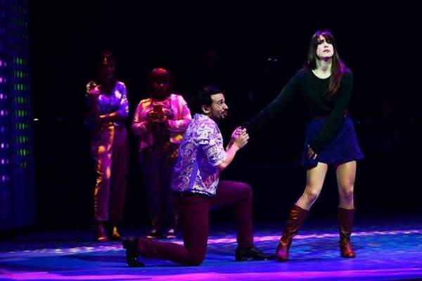 Christian Grey kneels before Anastasia Steele in a scene from "50 Shades! The Musical Parody", ongoing until March 20 at the Carlos P. Romulo Theater in RCBP Plaza, Makati City. 