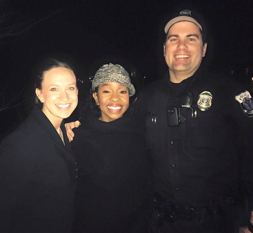 This photo provided by officer Paul Rogerson of the shows Rogerson, right, of the Pleasant Grove Police Department in Utah, singer Gladys Knight, center, and Rogerson's wife, left. AP 