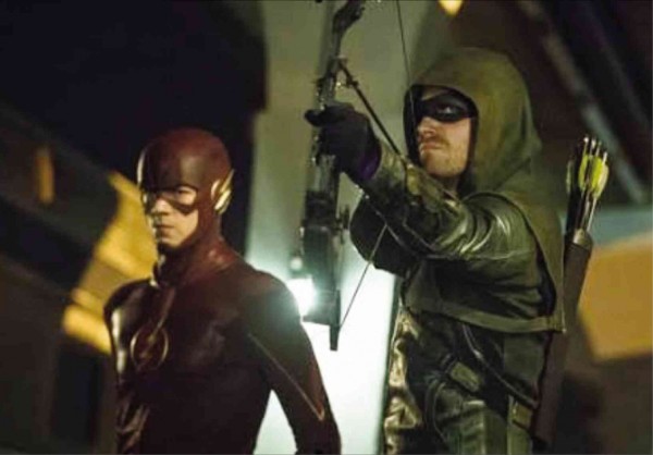 OCCASIONAL crimefighting duo: The “Scarlet Speedster”(left)  and Arrow (Stephen Amell) 