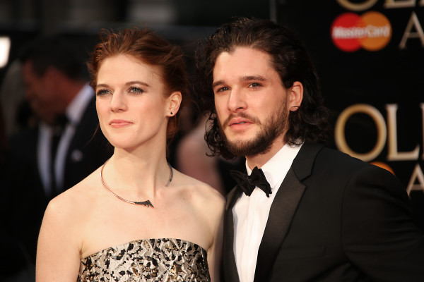 Actors Rose Leslie, left, and Kit Harrington pose for photographers upon arrival at the Olivier Awards in London, Sunday, April 3, 2016. (Photo by Joel Ryan/Invision/AP)