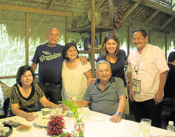 THE MALVARS (center, standing) with friends—Boots and King Rodrigo, Chiqui Puno and Mar Bacani—at Camp Explore.