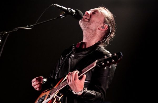 Lead singer Tom Yorke of the British band Radiohead performs on stage during a concert at the Heineken Music Hall in Amsterdam, on May 20, 2016. AFP PHOTO