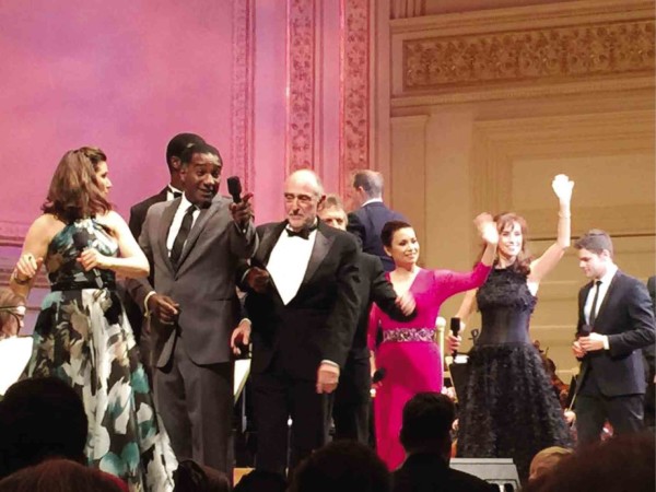 AT CARNEGIE Hall (from left): Stephanie J. Block, Norm Lewis, Kyle Scatliffe (partly hidden), Claude-Michel Schönberg, the author, Marie Zamora and Jeremy Jordan
