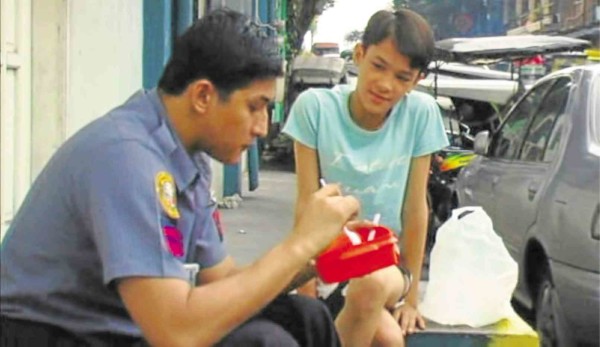 NATHAN Lopez (right) plays a young gay in love with a cop, portrayed by JR Valentin, in “Ang Pagdadalaga ni Maximo Oliveros.”