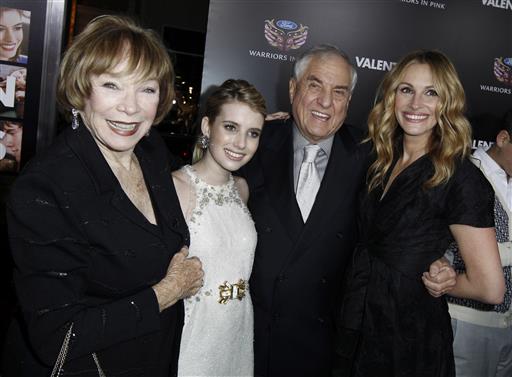 In this Feb. 8, 2010 file photo, Shirley MacLaine, from left, Emma Roberts, Garry Marshall, and Julia Roberts arrive at the premiere for Valentine's Day, in Los Angeles. Writer-director Marshall, whose TV hits included "Happy Days," "Laverne & Shirley" and box-office successes included "Pretty Woman" and "Runaway Bride," has died at age 81. Publicist Michelle Bega says Marshall died Tuesday, July 19, 2016, in at a hospital in Burbank, Calif., of complications from pneumonia after having a stroke. (AP Photo/Matt Sayles, File)
