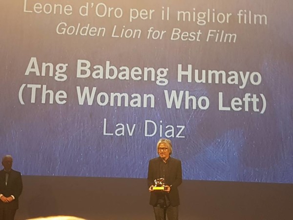 Lav Diaz holding the Golden Lion Award. CONTRIBUTED PHOTO from Ronald Arguelles