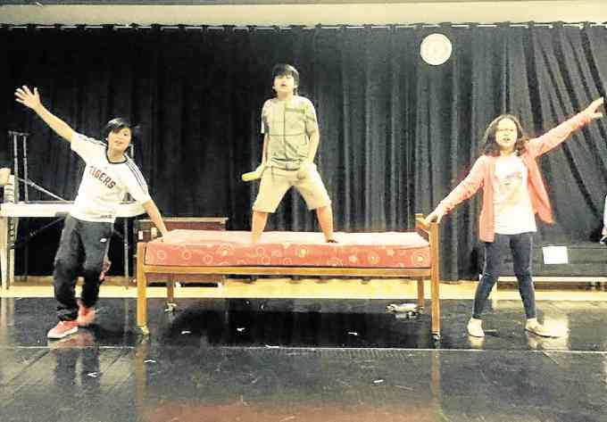 From left: Ronan Crisologo, Albert Silas and Andee Achacoso in “Fun Home”