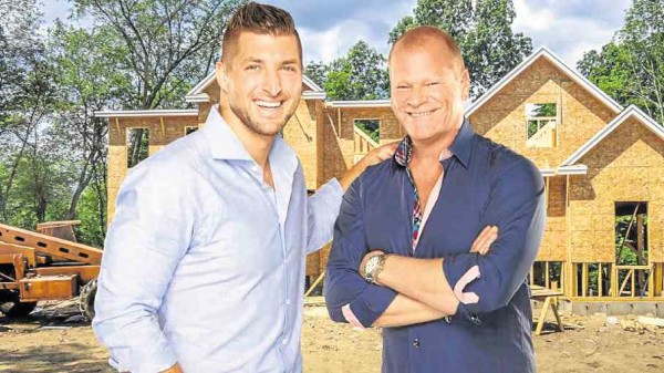 Home Free” hosts Tim Tebow (left) and Mike Holmes
