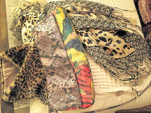She’s crazy for fur and animal-print scarves and bags.