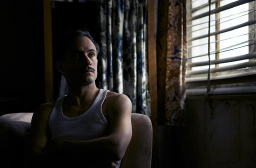 This image released by The Orchard shows Gael García Bernal in a scene from, "Neruda." (The Orchard via AP)