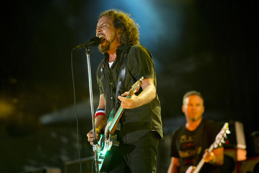 In this Sept. 2, 2012, file photo, Pearl Jam performs at the "Made In America" music festival in Philadelphia. The Seattle-based rockers and the late rapper Tupac Shakur lead a class of Rock and Roll Hall of Fame inductees that also include folkie Joan Baez and 1970s favorites Journey, Yes and Electric Light Orchestra. The hall's 32nd annual induction ceremony will take place on April 7, 2016, at Barclays Center in Brooklyn, N.Y. AP