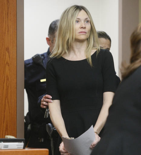 This Feb. 14, 2013 file photo shows Amy Locane Bovenizer entering the courtroom to be sentenced in Somerville, N.J. Locane-Bovenizer, convicted in a fatal drunken driving accident in 2010, won’t have to go back to prison, a judge ruled Friday, Jan. 13, 2017, at a resentencing spurred by an appeals court’s concerns that her original sentence may have been too lenient. The judge said Locane-Bovenizer's conduct since her release shows she isn't a threat to society. AP
