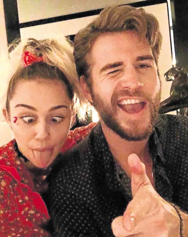 Miley Cyrus (left)  and Liam Hemsworth—Instagram