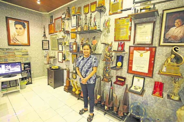 Nora Aunor in the trophy room which showcases various industry awards and citations  —Photos by Kimberly dela Cruz 