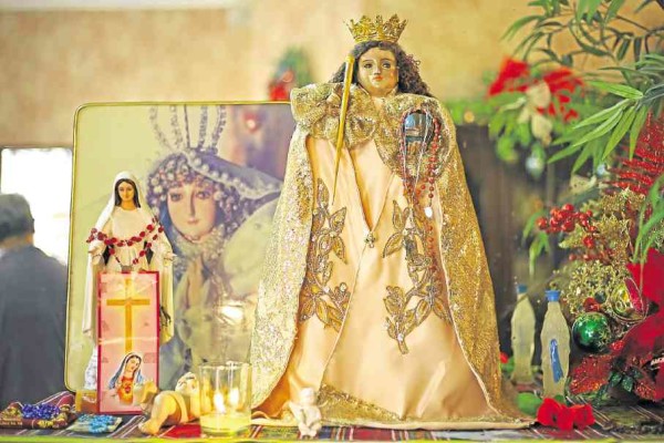 Antique Santo Niño and Virgin Mary imahen and a picture of Mater Dolorosa