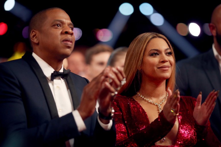 LOS ANGELES, CA - FEBRUARY 12: Jay Z (L) and Beyonce attend The 59th GRAMMY Awards at STAPLES Center on February 12, 2017 in Los Angeles, California.   Christopher Polk/Getty Images for NARAS/AFP