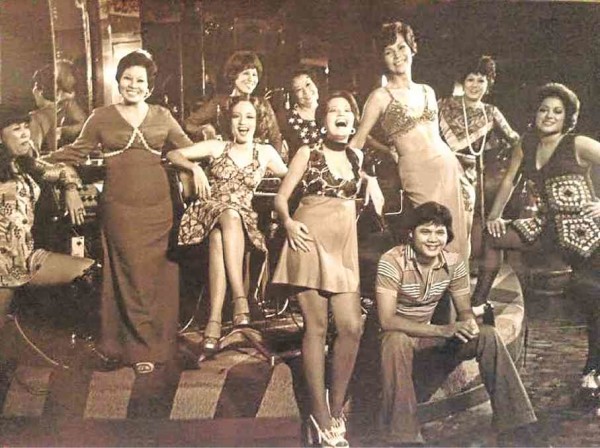 From left: Myrna Rosales, Lorli Villanueva, Laurice Guillen, June Keithley, Lolita Rodriguez and Mitch Valdes. Back, from left: Estrella Kuenzler, Chuchi and Metring David. Front, seated: Bembol Roco—Photo courtesy of Radha Cuadrado