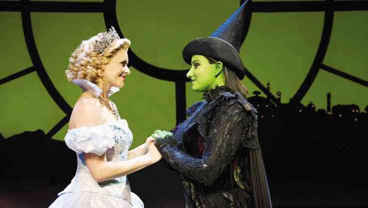 Carly Anderson portrays Glinda the Good Witch, while Jacqueline Hughes plays Elphaba the Wicked Witch.