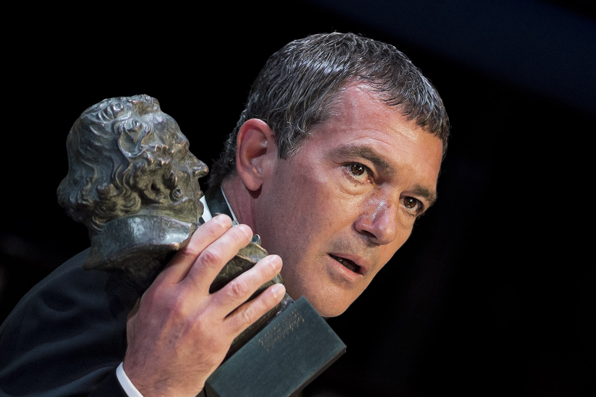 FILE - In this Feb. 7, 2015 file photo, Spanish actor Antonio Banderas holds his Honorific Goya trophy for his career, at the Goya Film Awards Ceremony in Madrid, Spain. Antonio Banderas says he has recovered from a heart attack that he had in January 2017. (AP Photo/Daniel Ochoa de Olza, File)