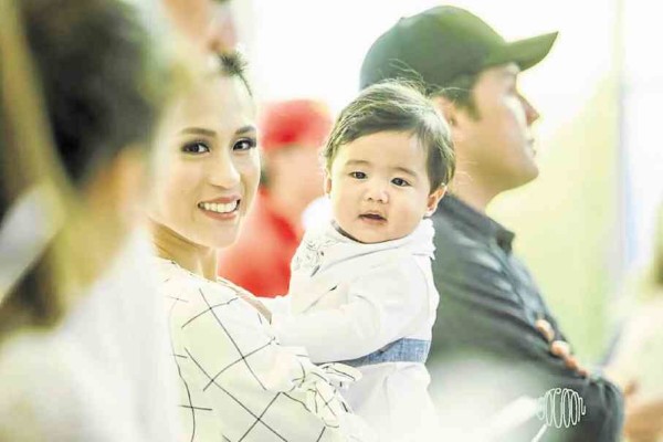 Toni (left) with son Seve and Paul Soriano