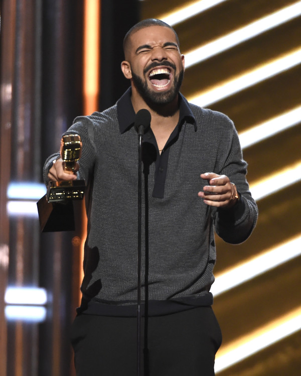 Drake accepts the award for top Billboard 200 album for "Views" at the Billboard Music Awards at the T-Mobile Arena on Sunday, May 21, 2017, in Las Vegas. (Photo by Chris Pizzello/Invision/AP)