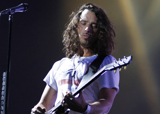 In this Sunday, Aug. 8, 2010, file photo, musician Chris Cornell of Soundgarden performs during the Lollapalooza music festival in Grant Park in Chicago. According to his representative, rocker Chris Cornell, who gained fame as the lead singer of Soundgarden and later Audioslave, has died Wednesday night in Detroit at age 52. AP FILE PHOTO