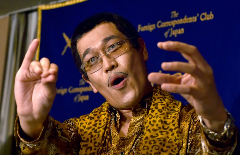 (FILES) This file photo taken on October 28, 2016 shows Japanese comedian Pikotaro posing during a press conference at the Foreign Correspondents' Club of Japan in Tokyo. American President Donald Trump will be serenaded with a bizarre hit song about a "pen-pineapple-apple-pen" on his visit to Japan in early November 2017 in an alarming example of life imitating art. / AFP PHOTO / Kazuhiro NOGI