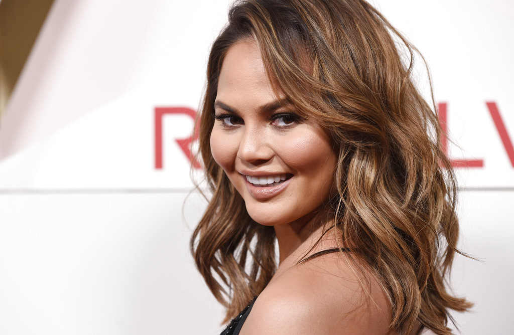 FILE - In this Nov. 2, 2017 file photo, model Chrissy Teigen poses at the 2017 Revolve Awards at the Dream Hollywood hotel in Los Angeles. Chrissy Teigen has shared her shock and worry in real-time during a powerful and deadly earthquake in Indonesia with her social media followers. The model, along with singer-husband John Legend and their two children, felt the shaking on neighboring Bali on Sunday, Aug. 5, 2018. (Photo by Chris Pizzello/Invision/AP,File)