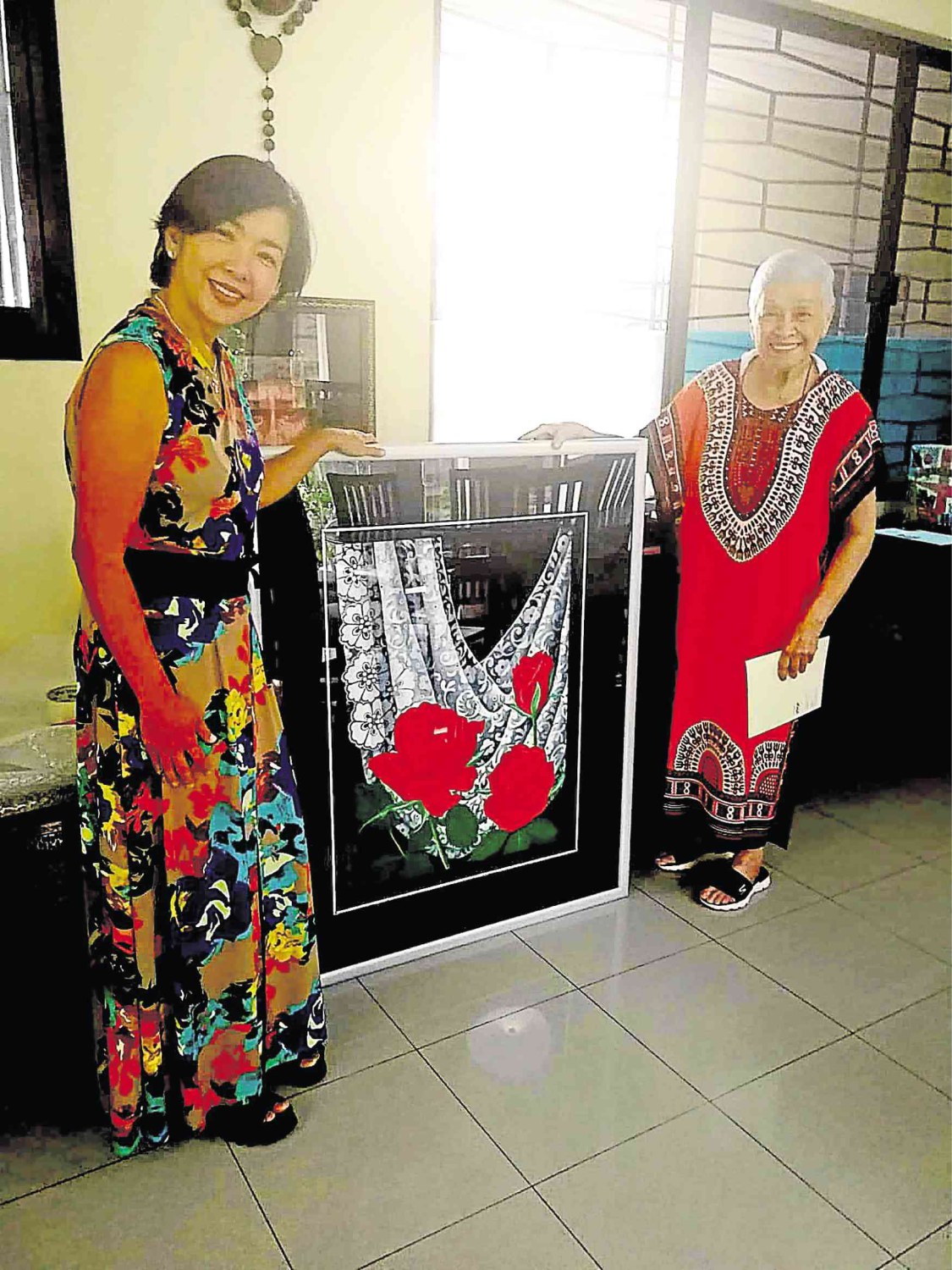 Isay Alvarez (left) and visual artist Cheloy Dans