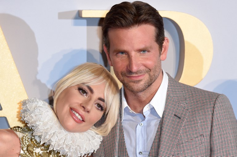 (FILES) In this file photo US singer/actress Lady Gaga (L) and US actor/director Bradley Cooper pose on the red carpet upon arrival for the UK premiere of the film "A Star is Born" in central London on September 27, 2018. - Hollywood's A-listers will hit the red carpet Sunday for the Golden Globes, the glitzy start to the entertainment industry's awards season, with popular music romance "A Star Is Born" the overwhelming favorite for top honors. (Photo by Anthony HARVEY / AFP)