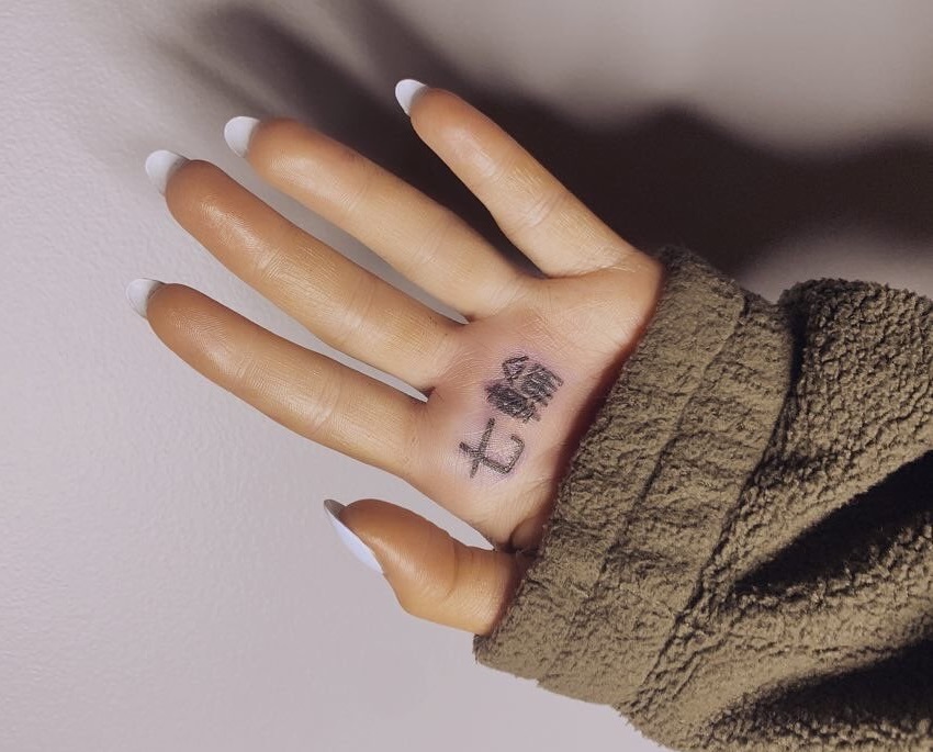 Fans call out Ariana Grande for misspelled Japanese tattoo