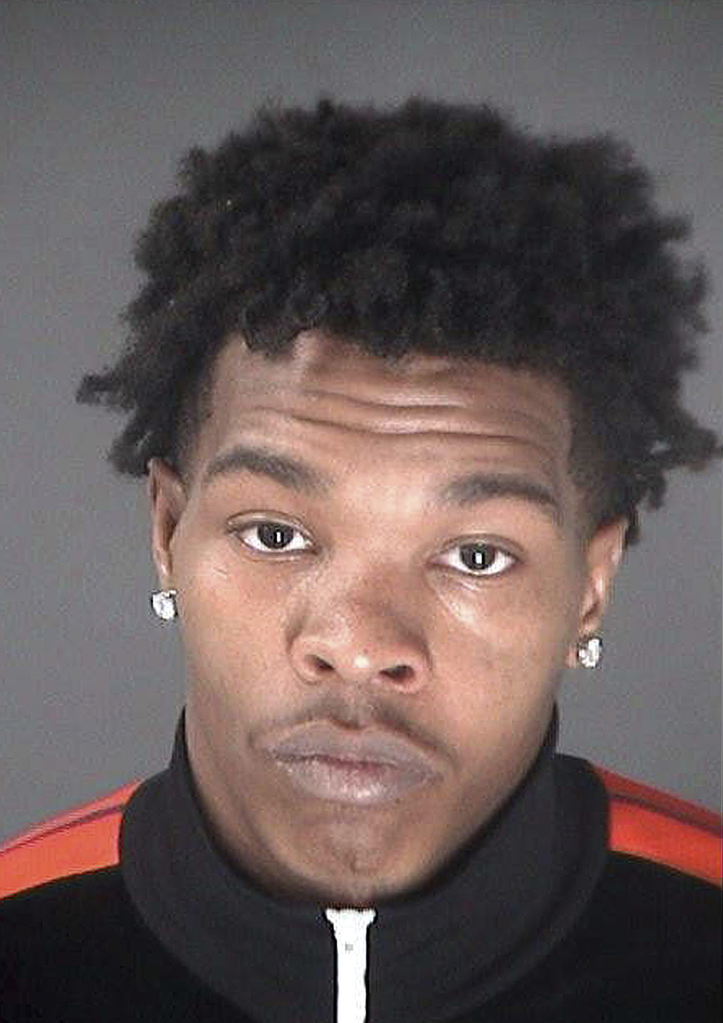 Rapper Lil Baby was arrested in Atlanta after he recklessly passed other ca...