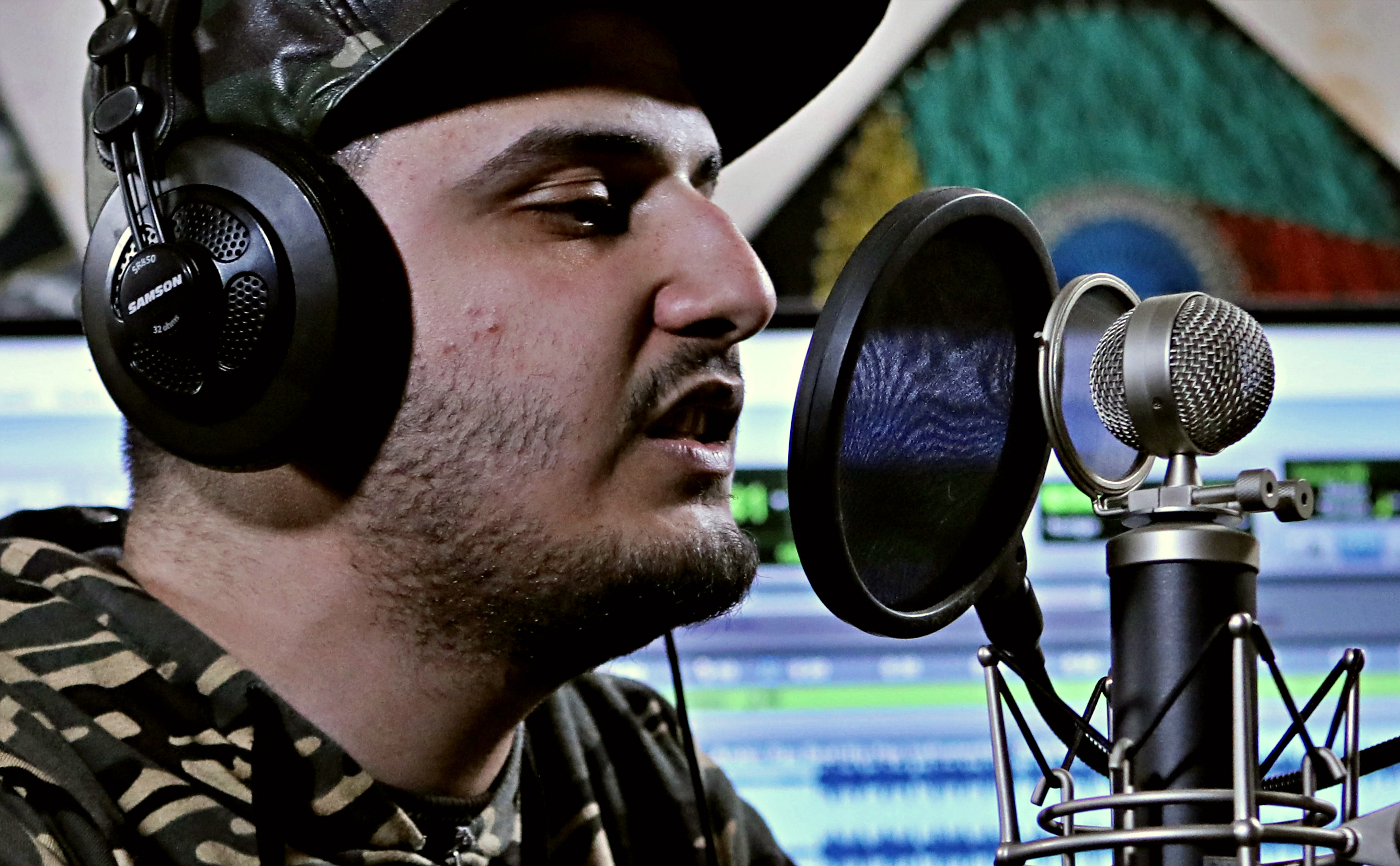 Iraqi rapper gives angry youth in city of Basra music outlet
