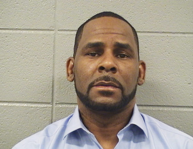 R. Kelly says ex-wife destroyed his name