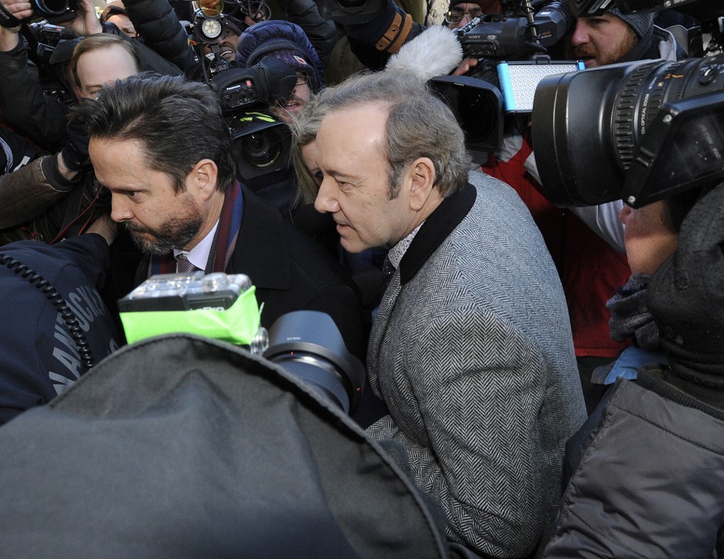 (FILES) In this file photo taken on January 7, 2019 Kevin Spacey exits the courthouse after making an appearance during his arraignment on at the Nantucket District Court, in Nantucket, Massachusetts. - Prosecutors dropped sexual assault proceedings against Spacey on July 17, 2019, after the case against the Hollywood star collapsed over his alleged victim's refusal to testify. William Little had accused the 59-year-old actor of groping him in a bar on the resort island of Nantucket in July 2016. But Massachusetts prosecutors filed a formal notice of abandonment of indecent assault and battery charges due to "the unavailability of the complaining witness," who had declined to give evidence due to fear of self-incrimination. (Photo by Joseph PREZIOSO / AFP)