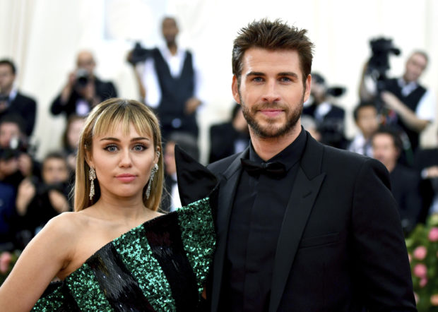  Cyrus and Hemsworth split after less than year of marriage