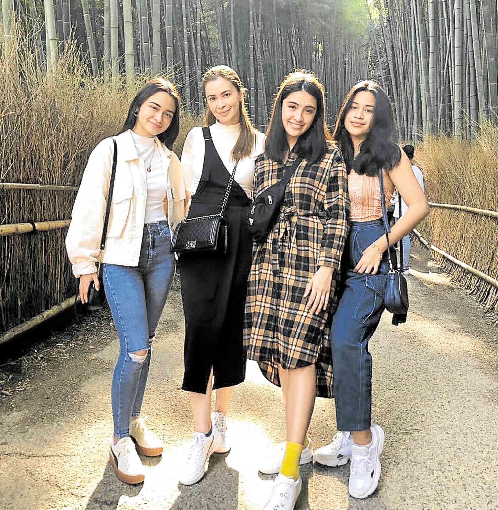 Sunshine Cruz (second from left) with daughters Angelina, Samantha and Cheska