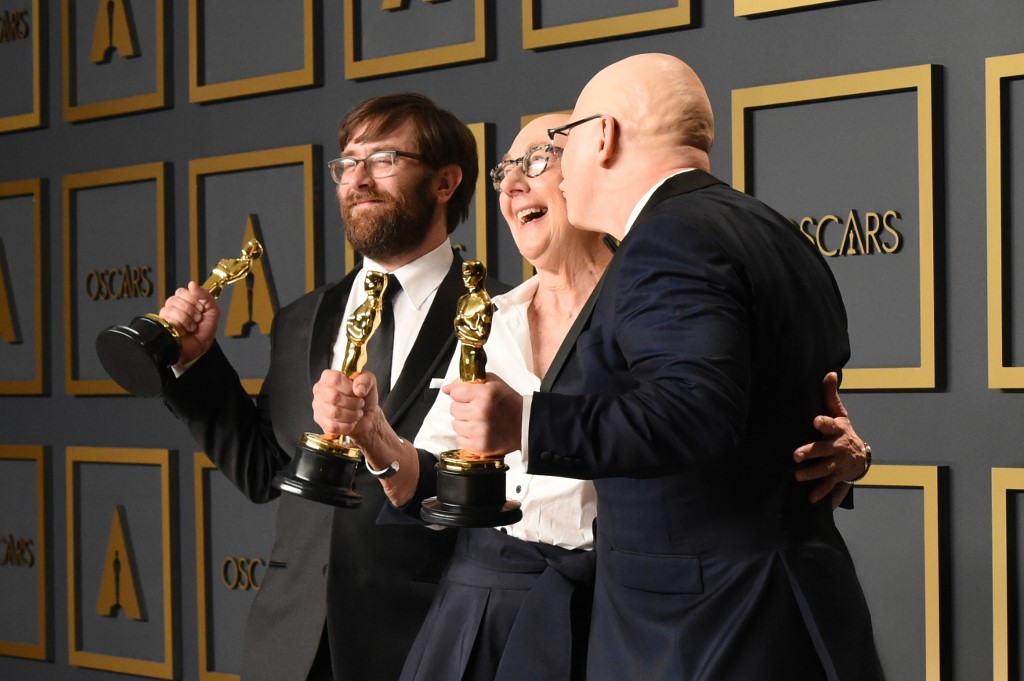 Obamas' first film wins best documentary Oscar