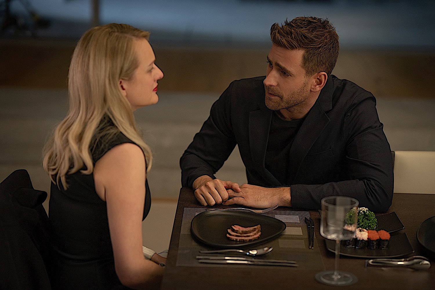 Elisabeth Moss (left) plays Cecilia Kass with Oliver Jackson- Cohen as Adrian Griffin in “The Invisible Man.”
